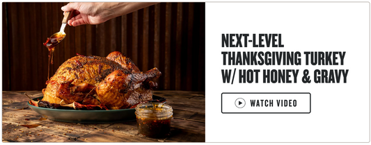 Roasted turkey with hot honey and gravy on a wooden table, with text promoting a next-level Thanksgiving turkey recipe.