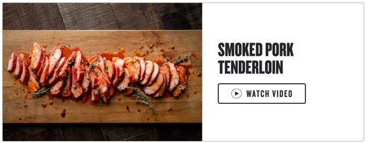 Sliced smoked pork tenderloin on a wooden cutting board with text 'Smoked Pork Tenderloin' and a 'Watch Video' button.